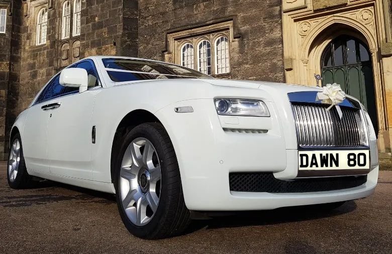 front rolls royce with dawn licence plate